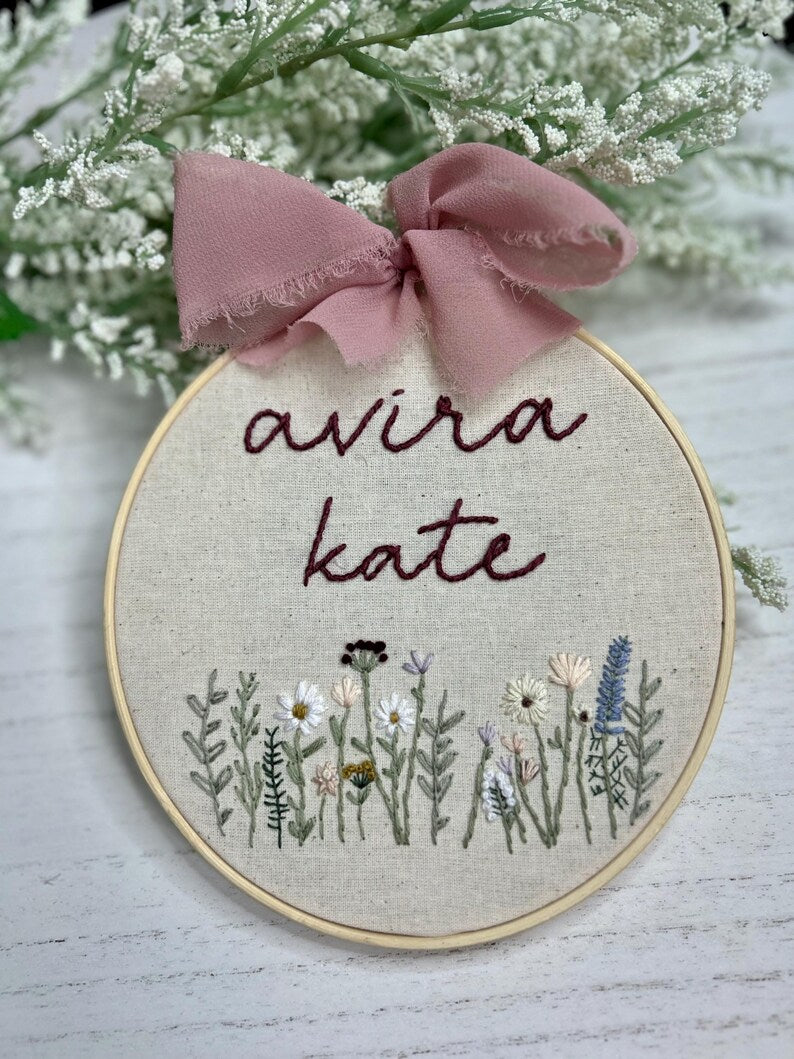 baby’s name with flowers and pink bow embroidery hoop