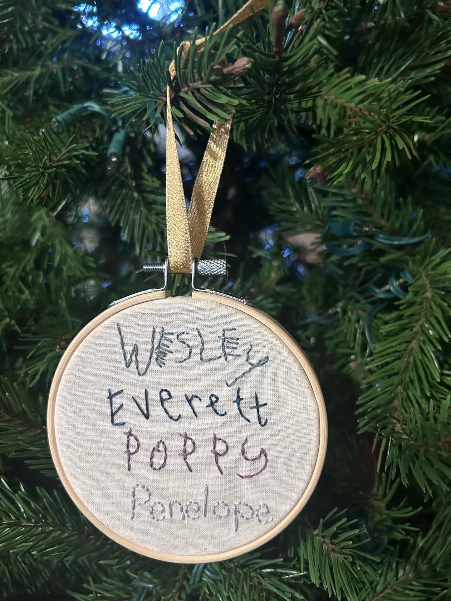 Four children’s handwritten names custom embroidered ornament on Christmas Tree