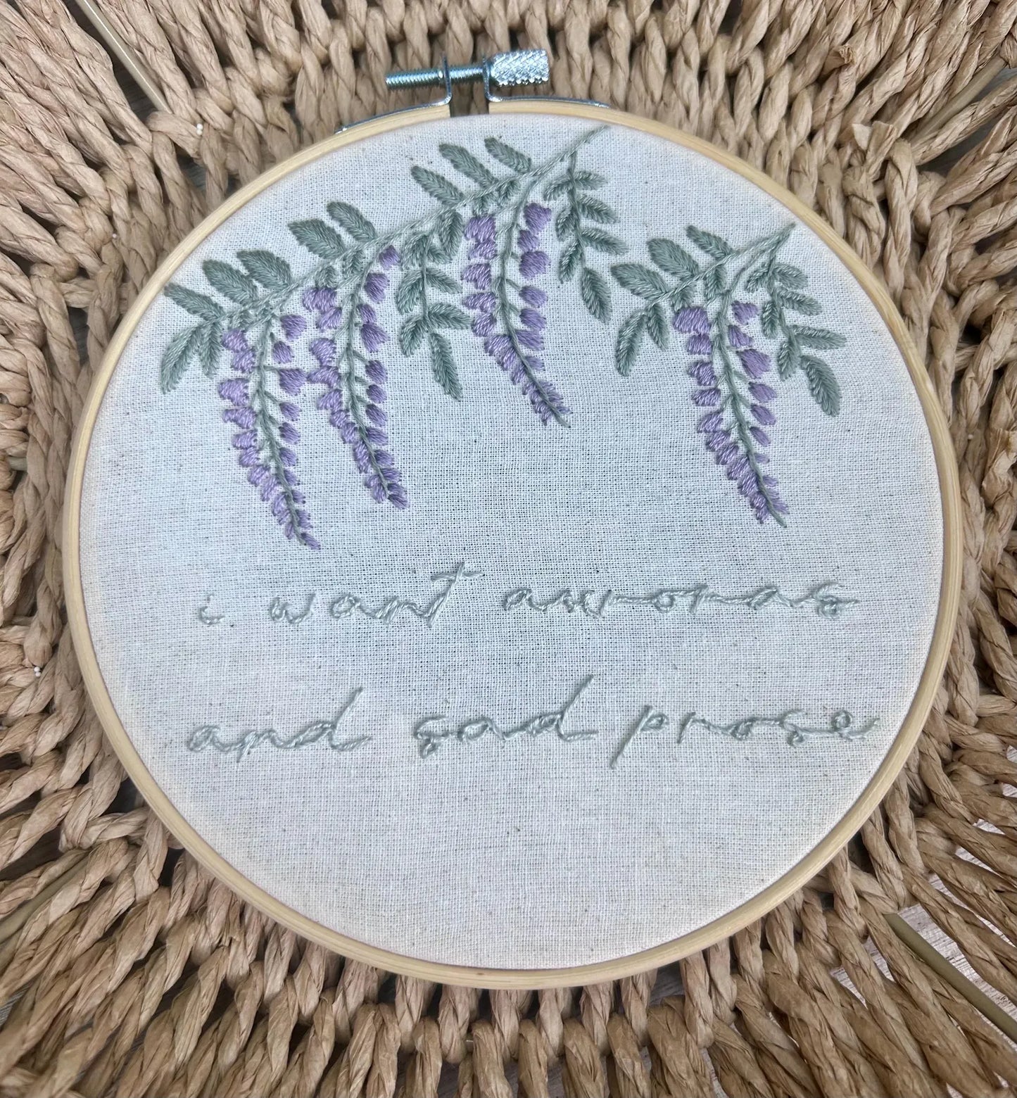 Wisteria flowers and Taylor Swift quote on embroidery hoop